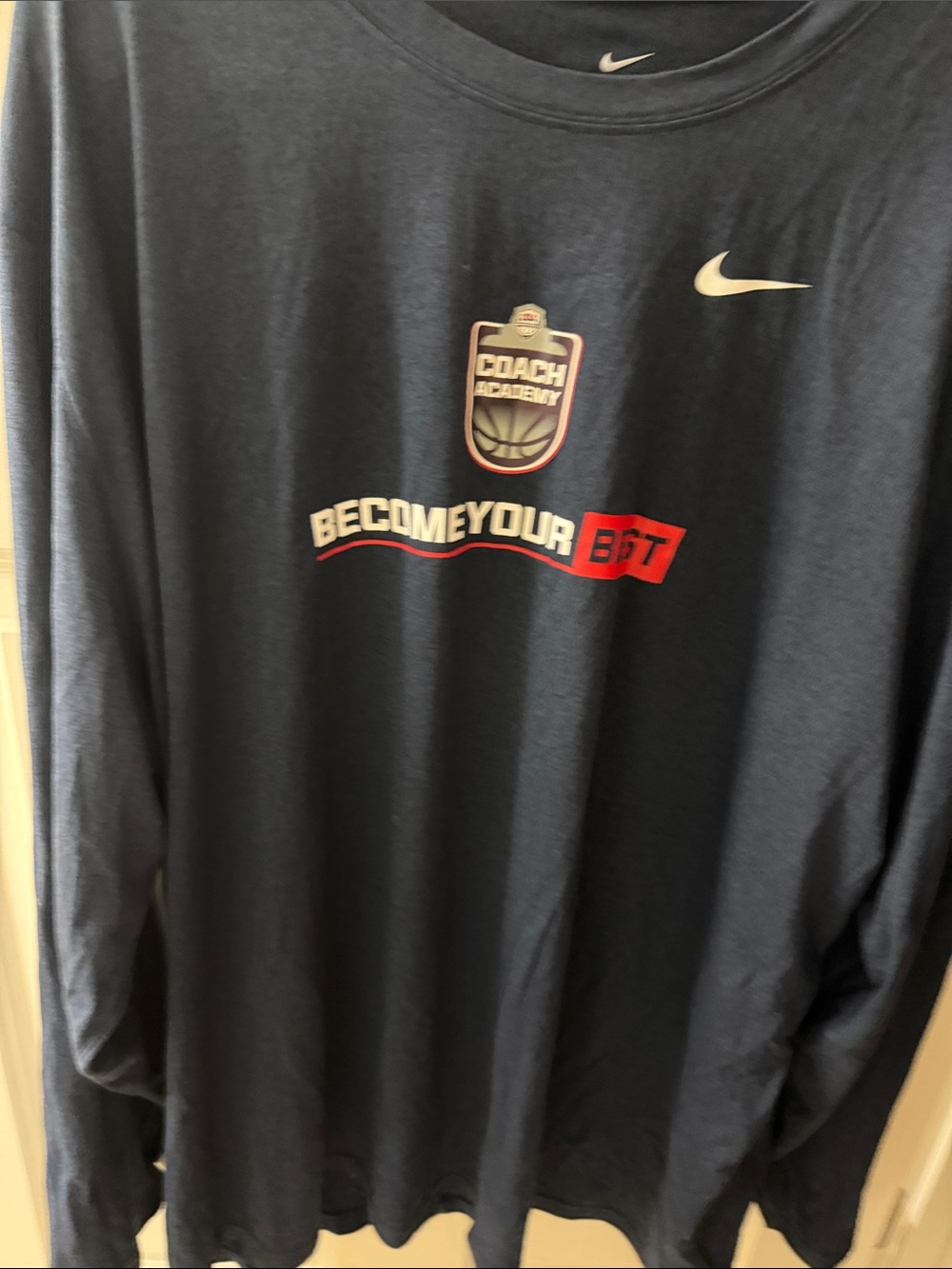 Nike Navy Blue Long Sleeve Tee with White Swoosh and Red Accent